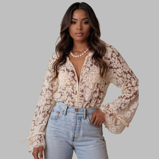 Woman wearing a lace top and jeans indoors